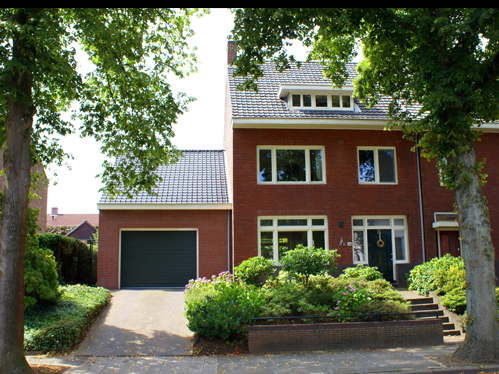 Uitbreiding woning met garage en woonkamer te Heerlen